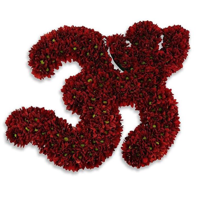 A bold, meticulously assembled number '33' formed from hundreds of small, tightly clustered blooms in a rich, deep burgundy-crimson hue, presented against a pristine white background that heightens the colour's intensity. The digits are built from button-style chrysanthemums or similar multi-petalled flowers, each bloom so closely massed that the whole reads as a plush, velvety surface; tiny green centers peek through across the numerals, offering gentle contrast and the visual suggestion of fresh stems and life beneath the massed petals. The arrangement casts a soft, diffused gray shadow beneath it, which lends depth and a slight floating quality, as if the numbers have been carefully set upon a white plinth beneath bright studio light. The craftsmanship is evident in the uniform density and shaped edges, the kind of attention to detail you expect from florists serving Emerson Park and the surrounding Hornchurch neighbourhood when a family asks for a striking milestone piece. This floral '33' can mark a thirty-third birthday, an anniversary, a jersey tribute, or a solemn commemoration; its colour and compact texture give it an air of dignity and celebration simultaneously. Freshness is implicit in the vivid hues and crisp petal edges, and the composition reads as both tactile and visual - a plush, living sculpture that speaks of memory, festivity, and thoughtful design within the local community.